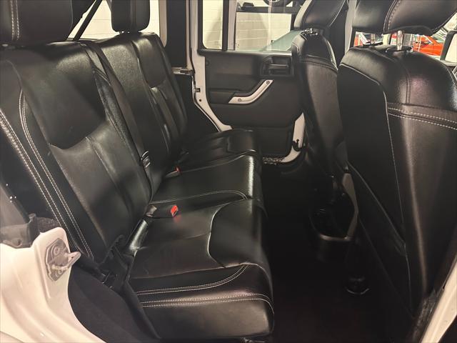 used 2016 Jeep Wrangler Unlimited car, priced at $18,791