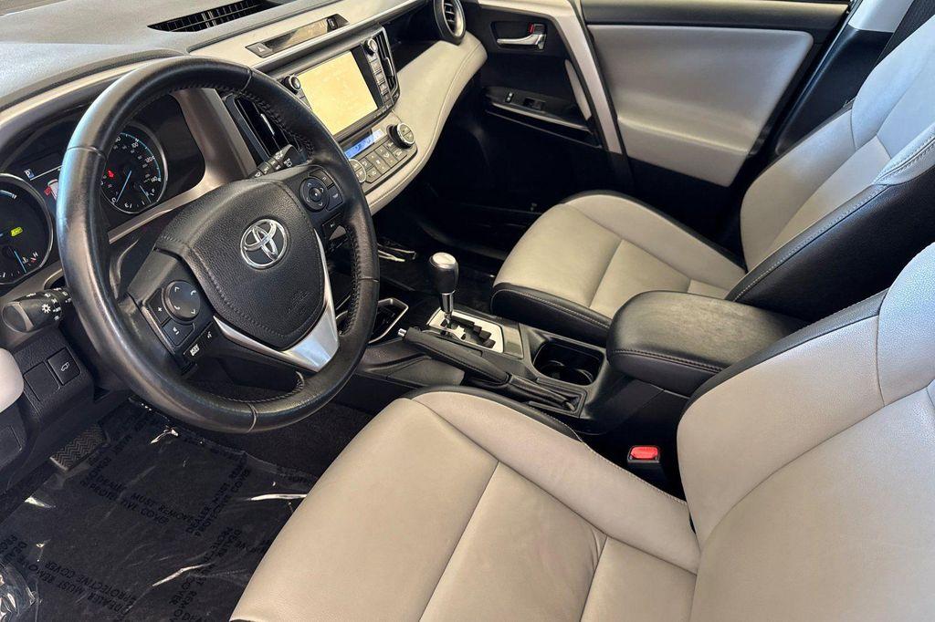 used 2018 Toyota RAV4 Hybrid car, priced at $23,997