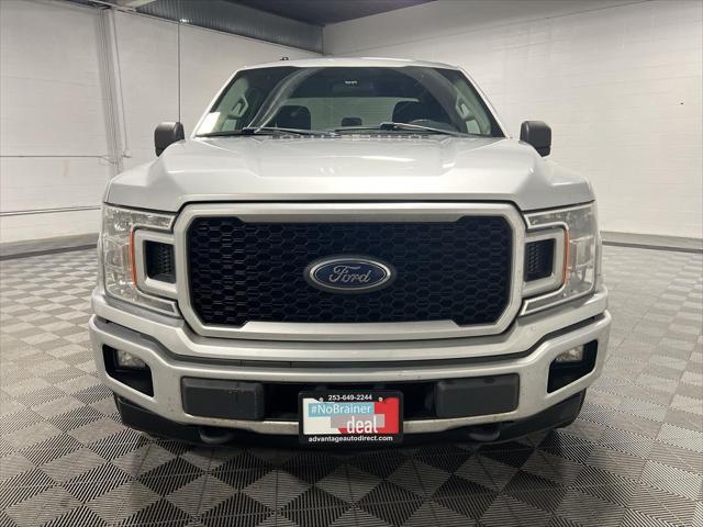 used 2018 Ford F-150 car, priced at $12,800