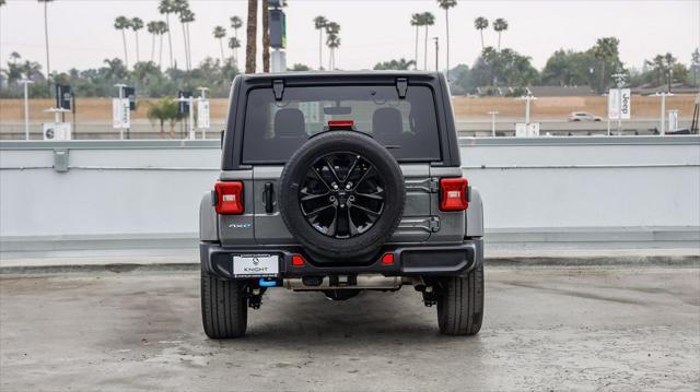 used 2023 Jeep Wrangler 4xe car, priced at $29,395