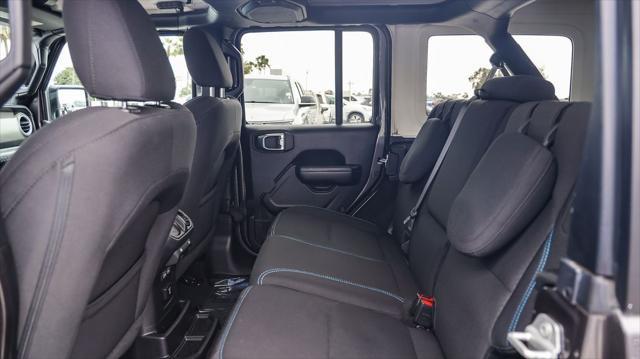 used 2023 Jeep Wrangler 4xe car, priced at $34,795