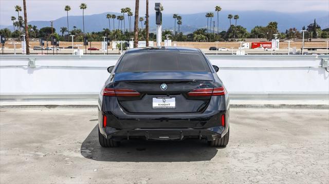 used 2024 BMW i5 car, priced at $74,995