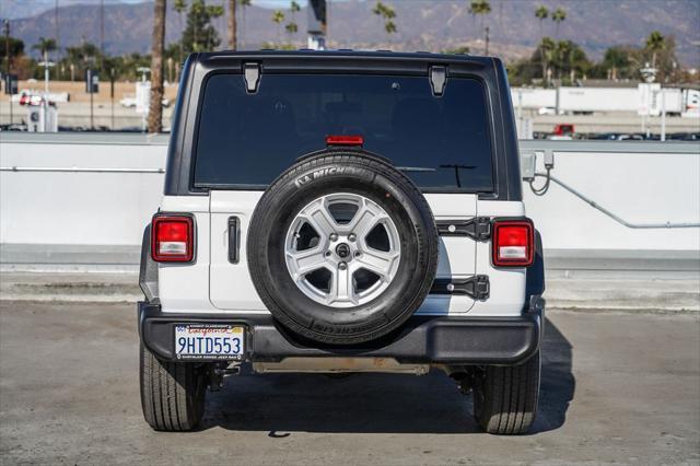 used 2023 Jeep Wrangler car, priced at $28,195