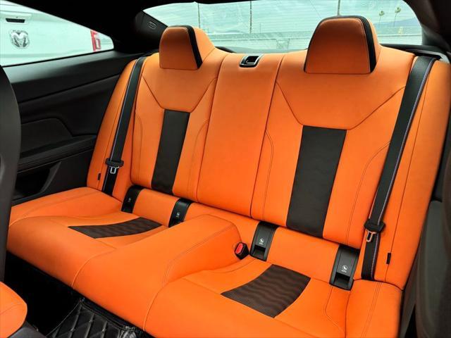 used 2024 BMW M4 car, priced at $81,995