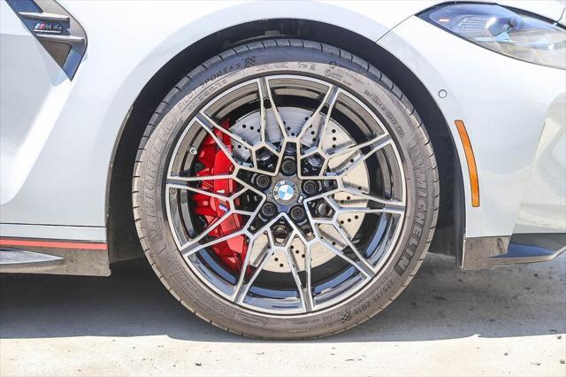 used 2024 BMW M4 car, priced at $73,995
