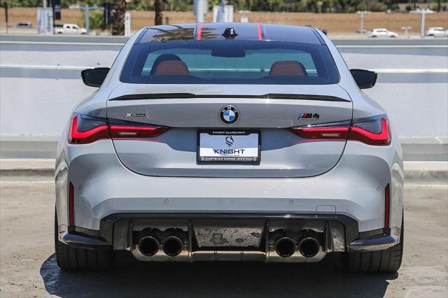 used 2024 BMW M4 car, priced at $73,995