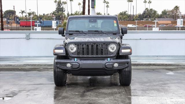 used 2024 Jeep Wrangler 4xe car, priced at $35,888