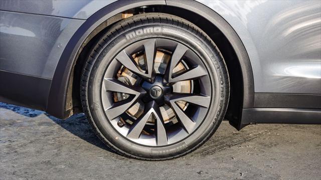 used 2023 Tesla Model X car, priced at $54,695