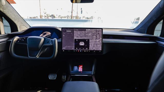 used 2023 Tesla Model X car, priced at $54,695
