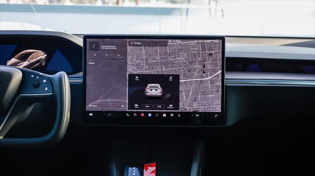 used 2023 Tesla Model X car, priced at $54,695