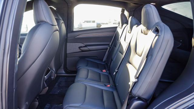 used 2023 Tesla Model X car, priced at $54,695