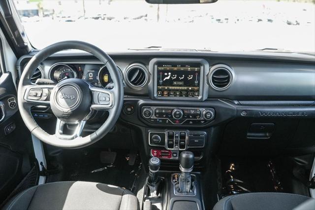 used 2023 Jeep Wrangler 4xe car, priced at $33,888