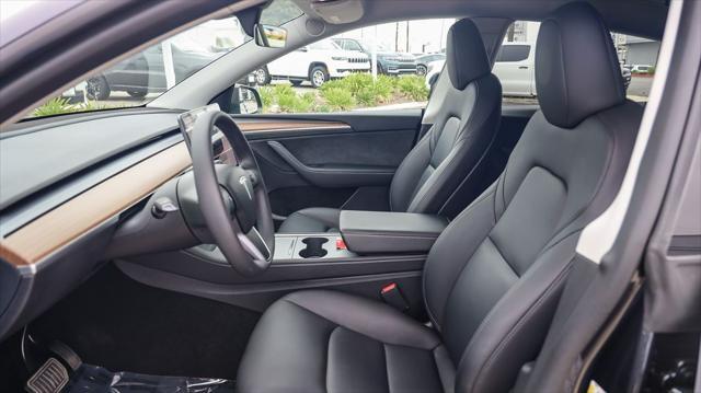 used 2024 Tesla Model Y car, priced at $32,995