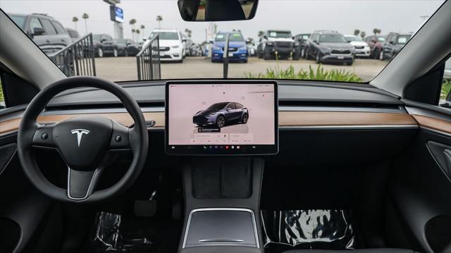 used 2024 Tesla Model Y car, priced at $32,995