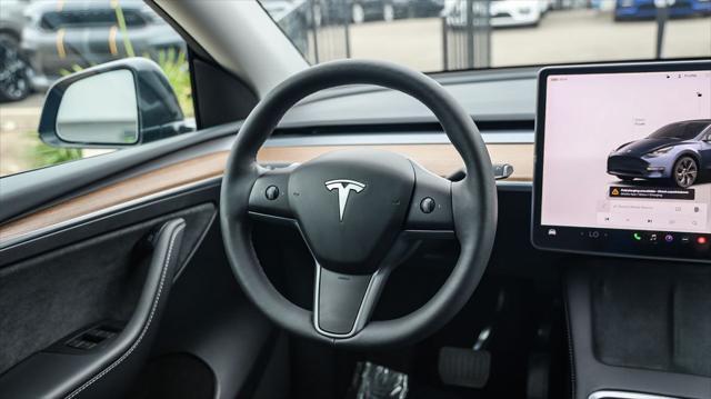 used 2024 Tesla Model Y car, priced at $32,995