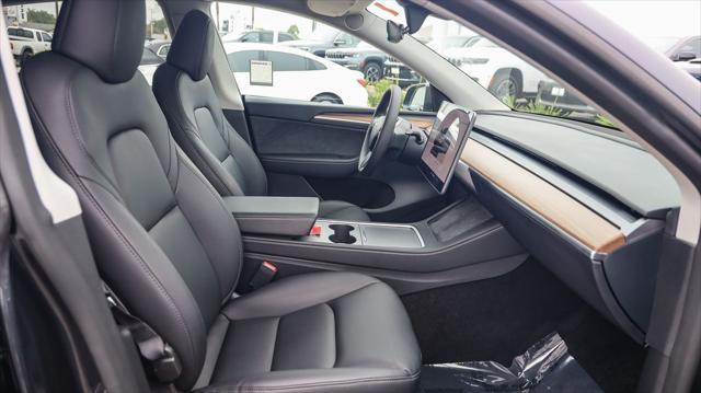 used 2024 Tesla Model Y car, priced at $32,995