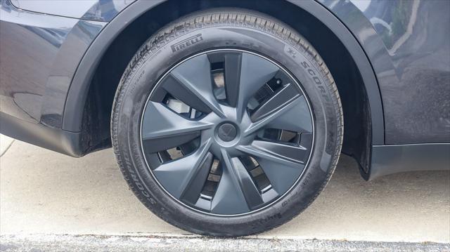 used 2024 Tesla Model Y car, priced at $32,995