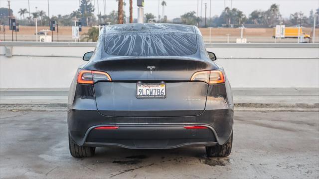 used 2024 Tesla Model Y car, priced at $37,995