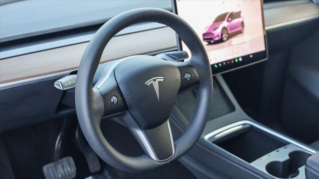 used 2024 Tesla Model Y car, priced at $37,995