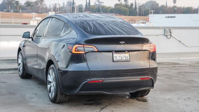 used 2024 Tesla Model Y car, priced at $37,995