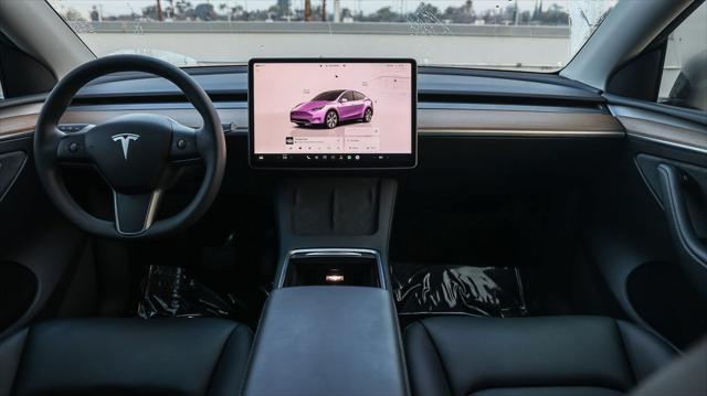 used 2024 Tesla Model Y car, priced at $37,995