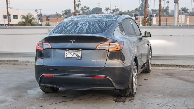 used 2024 Tesla Model Y car, priced at $37,995