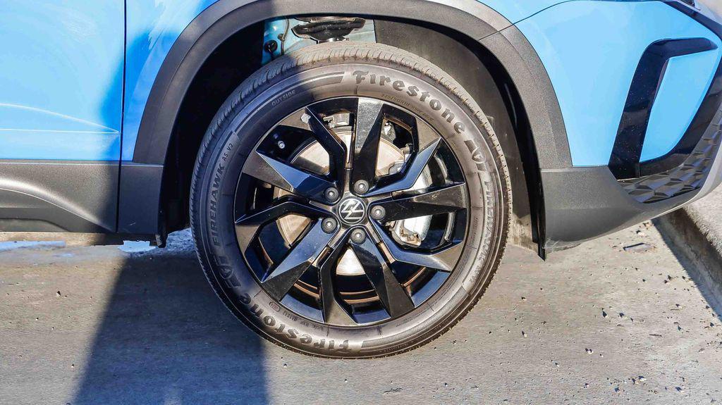 used 2023 Volkswagen Taos car, priced at $16,995