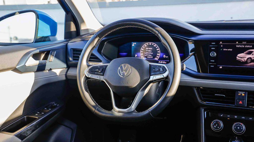 used 2023 Volkswagen Taos car, priced at $16,995