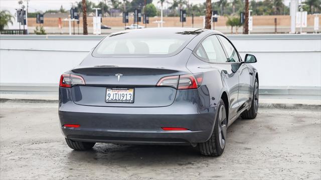used 2023 Tesla Model 3 car, priced at $23,995