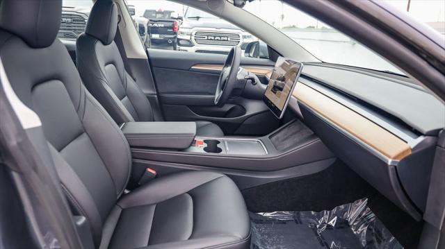 used 2023 Tesla Model 3 car, priced at $23,995