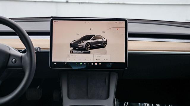 used 2023 Tesla Model 3 car, priced at $23,995