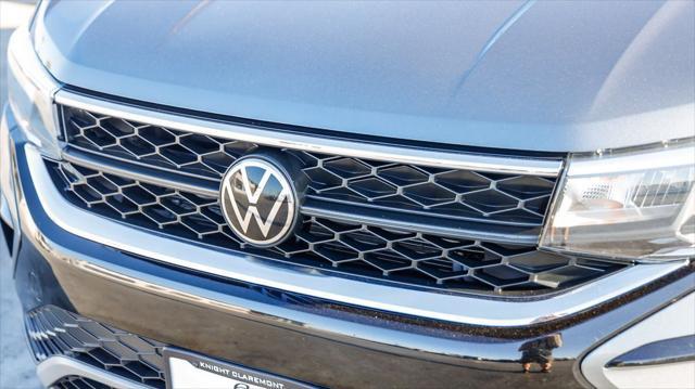 used 2023 Volkswagen Taos car, priced at $20,495