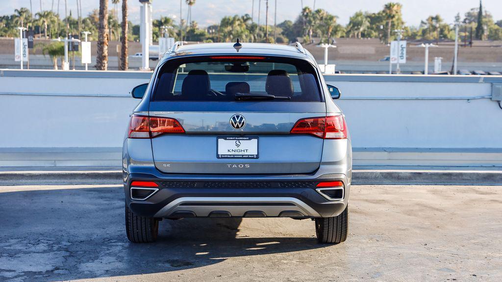 used 2023 Volkswagen Taos car, priced at $16,495