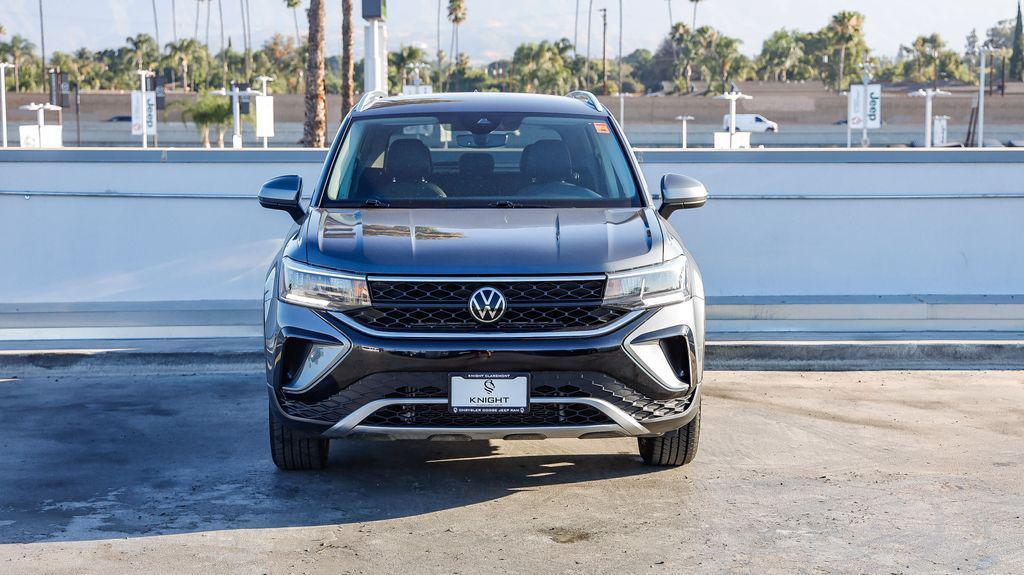used 2023 Volkswagen Taos car, priced at $16,495