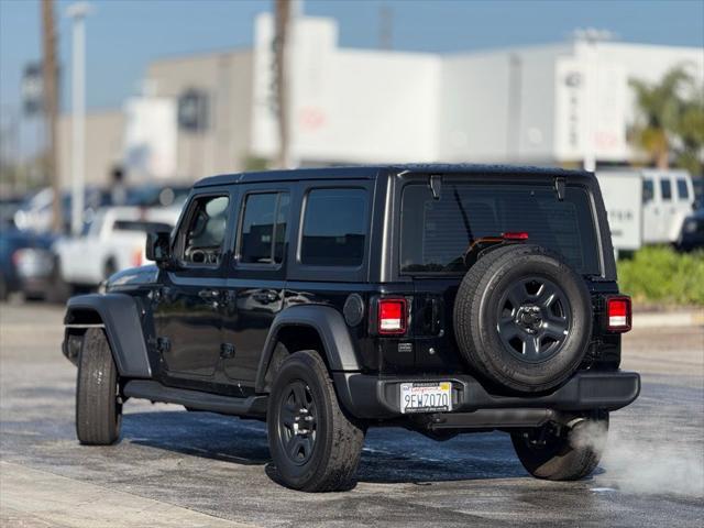 used 2023 Jeep Wrangler car, priced at $30,295