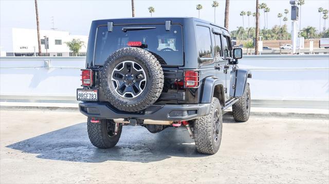 used 2015 Jeep Wrangler Unlimited car, priced at $24,888