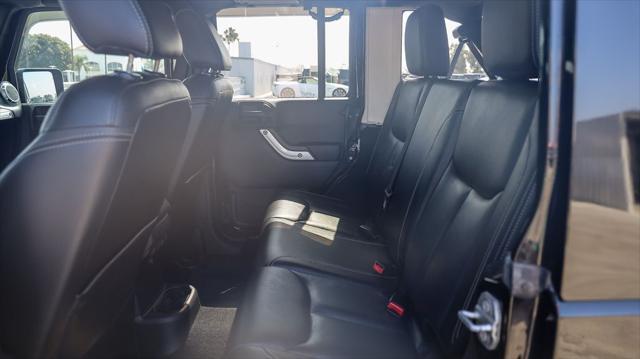 used 2015 Jeep Wrangler Unlimited car, priced at $24,888