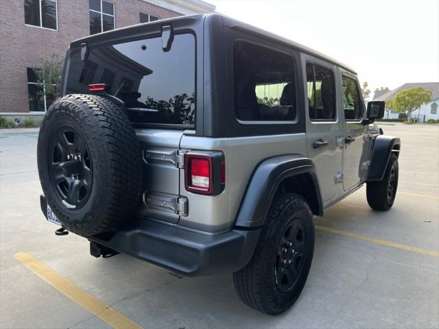 used 2018 Jeep Wrangler Unlimited car, priced at $23,588