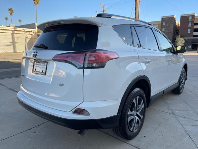 used 2018 Toyota RAV4 car, priced at $15,987