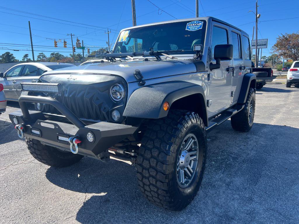 used 2014 Jeep Wrangler Unlimited car, priced at $19,205
