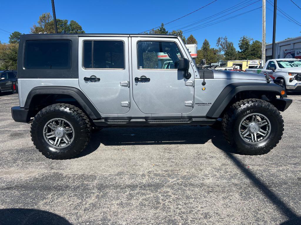used 2014 Jeep Wrangler Unlimited car, priced at $19,205