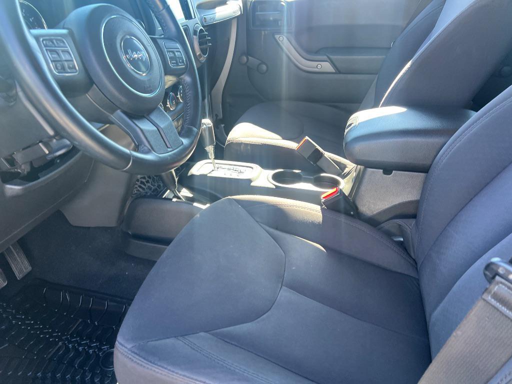 used 2014 Jeep Wrangler Unlimited car, priced at $19,205