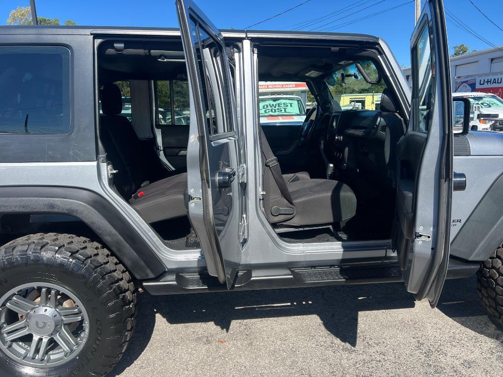 used 2014 Jeep Wrangler Unlimited car, priced at $19,205