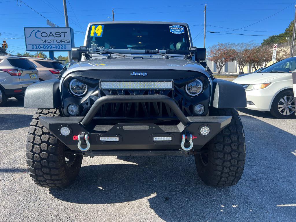 used 2014 Jeep Wrangler Unlimited car, priced at $19,205