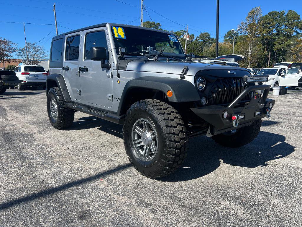 used 2014 Jeep Wrangler Unlimited car, priced at $19,205