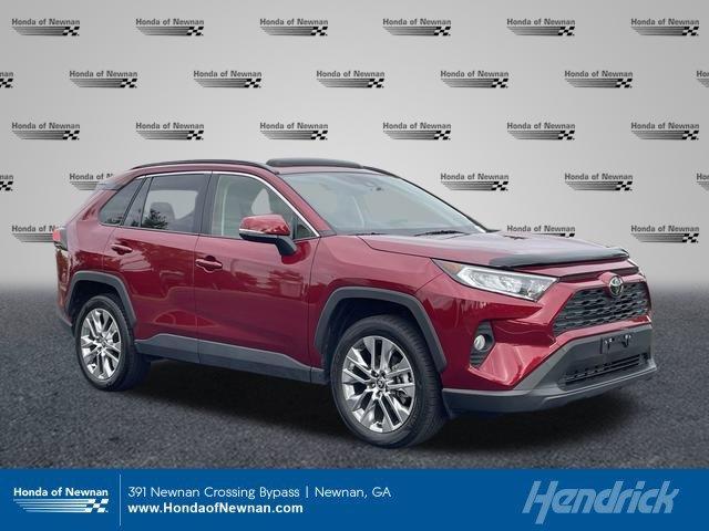 used 2021 Toyota RAV4 car, priced at $29,677