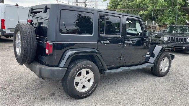 used 2015 Jeep Wrangler Unlimited car, priced at $16,775