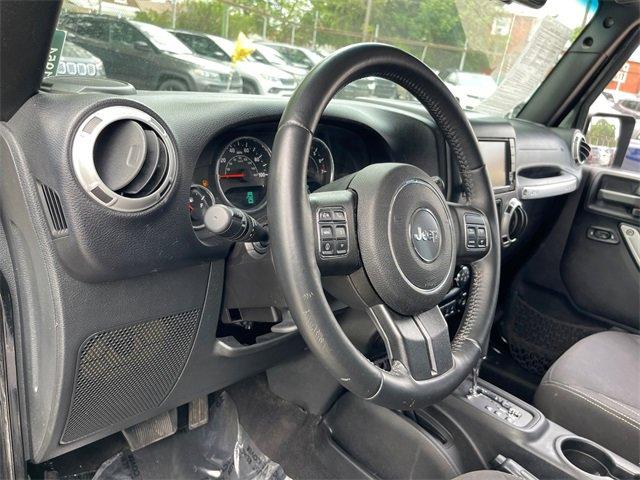 used 2015 Jeep Wrangler Unlimited car, priced at $16,775