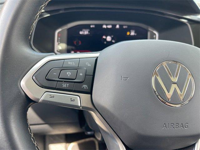 used 2023 Volkswagen Taos car, priced at $23,000