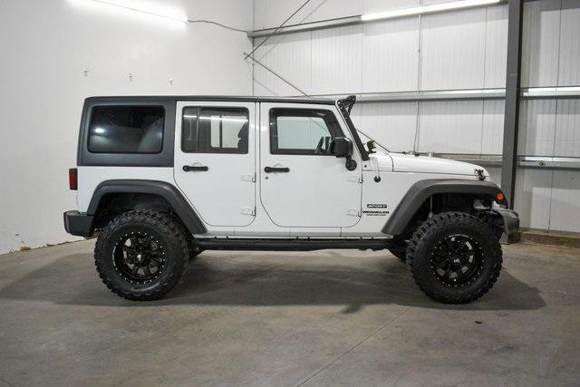 used 2015 Jeep Wrangler Unlimited car, priced at $20,995